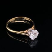 A DIAMOND ROUND BRILLIANT CUT SOLITAIRE RING. APPROXIMATE CALCULATED WEIGHT 0.79cts. COLOUR H,