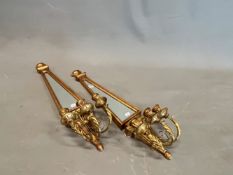 A PAIR OF GILT WOOD GIRANDOLES, EACH WITH THREE CANDLE BRANCHES BELOW BEVELLED GLASS TRIANGULAR