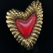 A VINTAGE BALENCIAGA PARIS SIGNED RED LUCITE HEART BROOCH WITH HEAVY WOVEN ROPE BORDER COMPLETE WITH
