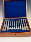 A VICTORIAN MAHOGANY CASED SET OF TWELVE BEAD PATTERN ELECTROPLATE FISH KNIVES AND FORKS, THE BLADES