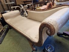 A REGENCY SIMULATED ROSEWOOD CHAISE WITH SCROLL ENDS WITH SQUAB CUSHION ON SABRE LEGS. W 190 D
