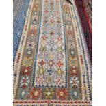 TWO SIMILAR TRIBAL KELIM RUGS OF SIMILAR DESIGN AND SIZE LARGEST 235 x 86cms (2)