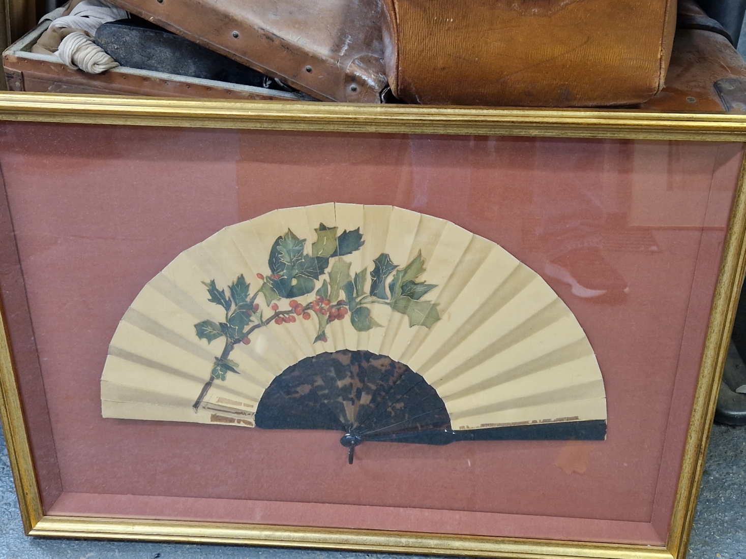 A 1881-3 FAN IN A DOUBLE SIDED FRAME, THE BACK OF THE HOLLY PAINTED LEAF SIGNED BY FRENCH