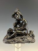 A 19th C. BRONZE FIGURE OF A SEATED BOY SOMNULENT AFTER A PICNIC. W 15cms.