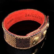 A LOUIS VUITTON BOND STREET OPENING STORE 24/02/98 DAMIER BRACELET. THE INSIDE STAMPED 17-18 NEW