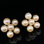 A PAIR OF DAISY STYLE PEARL EARRINGS. THE SETTINGS UNHALLMARKED, ASSESSED AS 10ct GOLD. APPROX PEARL