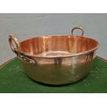 A 19th C. COPPER TWO HANDLED JAM PAN. Dia. 47.5cms.