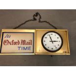 ITS OXFORD MAIL TIME, A MID 20th C. GILT METAL FRAMED POSTER AND SMITHS CLOCK WITH A BROWN