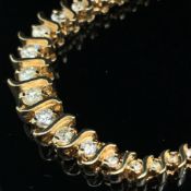 A 14ct HALLMARKED GOLD AND DIAMOND TENNIS LINE NECKLACE. APPROX ESTIMATED DIAMOND WEIGHT 1.50cts.
