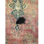 A PERSIAN KIRMAN CARPET 492 x 290cms