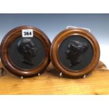 A PAIR OF FRAMED BOIS DURCI ROUNDELS OF VICTORIA QUEEN OF ENGLAND AND OF PRINCE ALBERT