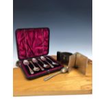 A SILVER CREAM JUG WITH A ROSEWOOD HANDLE, LONDON 1979, A SILVER CARD CASE, LONDON 1979, A CASED SET