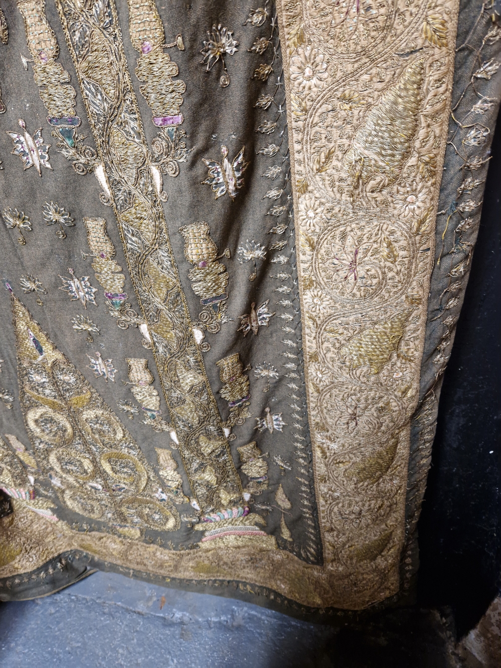 AN INDIAN PANEL SEWN IN GOLD THREAD AND COLOURED SILKS WITH A CANDELABRUM ABOVE A LEAF WITHIN AN - Image 3 of 5