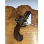 AN UNUSUAL LATE 18th CENTURY FLINTLOCK DOUBLE BARREL OVER UNDER POCKET PISTOL WITH TWIN TURN OFF
