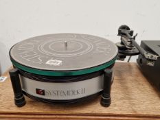 A RARE 1980'S SYSTEM DEK II SPRUNG CHASSIS RECORD TURNTABLE. TOGETHER WITH A NAD SERIES 20
