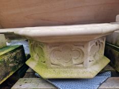 A PAIR OF COMPOSITE STONE GOTHIC STYLE GARDEN URNS. H 73 D 66cms EXCLUDING LATER WOOD PLINTHS