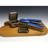 A BLUE ENAMELLED SILVER PART DRESSING TABLE SET BY BARKER BROTHERS, BIRMINGHAM 1930/1, COMPRISING: A