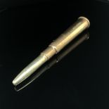 A 9ct HALLMARKED GOLD CIGAR PIERCER IN THE FORM OF A BULLET, DATED 1939,SPONSOR MARK E BAKER &