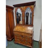 AN 18th C. BURR WALNUT BUREAU BOOK CASE, THE OGEE ARCHED MIRRORED DOORS TO THE TOP WITH FOLIATE