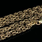 A 9ct GOLD HALLMARKED BYZANTINE LINK CHAIN. LENGTH 71cms. WEIGHT 33.1grms.