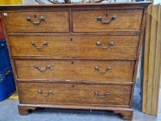 A 19th C. MAHOGANY CROSS BANDED OAK CHEST OF TWO SHORT AND THREE LONG DRAWERS ON BRACKET FEET. W 110