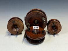 FOUR WOODEN FISHING REELS, THE LARGEST. Dia. 12.5cms. AND THE SMALLEST 7.5cms.