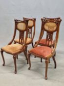 A SET OF FOUR 20th C. MAHOGANY CHAIRS, EACH TOP RAIL CURVED ABOVE FLORAL PIERCING IN THE ART NOUVEAU