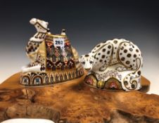A ROYAL CROWN DERBY CAMEL TOGETHER WITH A 2005 ROYAL CROWN DERBY SNOW LEOPARD