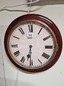 A MAHOGANY CASED WALL CLOCK, THE TIMEPIECE WITH PENDULUM MOVEMENT AND PAINTED DIAL. Dia 39cms.