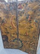 A 17th C. TASTE LEATHER THREE FOLD SCREEN, EACH PANEL PAINTED WITH BIRDS AND FLOWERING TREES ON A