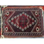 A TURKISH TRIBAL RUG 130 x 83cms TOGETHER WITH TWO SMALLER AFGHAN MATS (3)