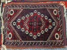 A TURKISH TRIBAL RUG 130 x 83cms TOGETHER WITH TWO SMALLER AFGHAN MATS (3)