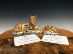 A 2006 ROYAL CROWN DERBY LIONESS, 479/950 TOGETHER WITH A 2006 SLEEPY LION CUB, 479/950, BOTH FOR