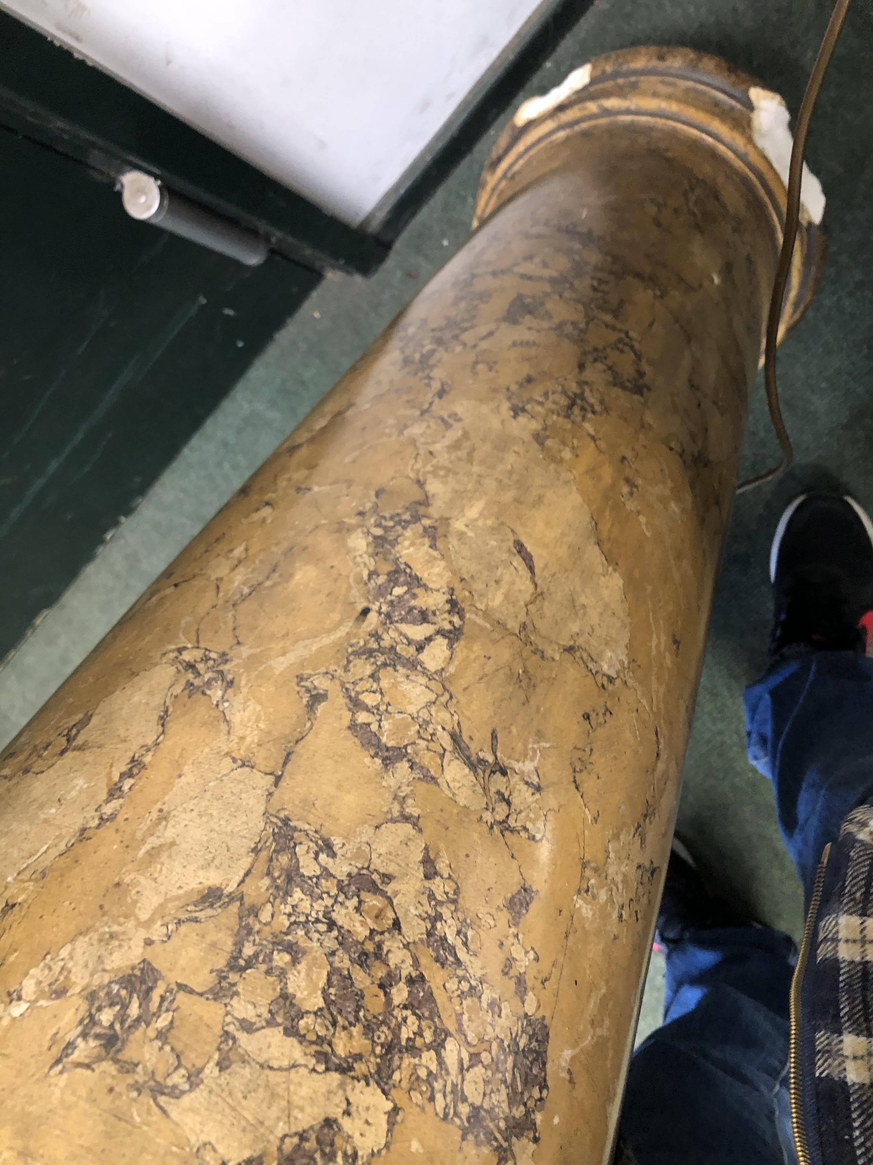 A SIMULATED MOTTLED OCHRE MARBLE CYLINDRICAL COLUMN ON A SOCLE FOOT. H 110cms. - Image 6 of 13