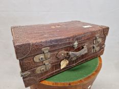 A CROCODILE SUITCASE WITH INTERIOR TRAY. W 70 x D 42 x H 26cms.