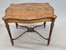 A 19th C. SATINWOOD TABLE, THE TOP WITH BOWED EDGES AND ROUNDELS OVER THE LEGS, THE CENTRAL