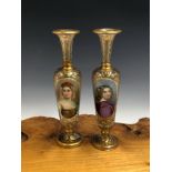 A PAIR OF 19TH CENTURY BOHEMIAN GLASS SLENDER VASES EACH WITH FOLIATE GILT DECORATION CENTRED WITH