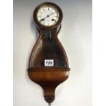A GLAZED ROSEWOOD WALL CLOCK THE ENAMEL DIAL INSCRIBED HENRI MARC, THE MOVEMENT STRIKING ON A BELL