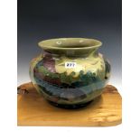 A WALTER MOORCROFT FISH PATTERN PALE OLIVE GREEN BOWL. Dia. 26cms.