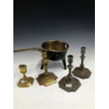 AN 18th C. BRONZE TRIPOD SKILLET,THE HANDLE WITH THE MAKERS NAME, A PAIR OF PEWTER CANDLESTICKS, A