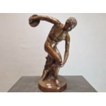 AFTER THE ANTIQUE, A BRONZE FIGURE OF A DISCUS THROWER. H 68cms.
