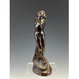 A BRONZE FIGURE OF A NUDE LADY TIED TO A POST WITH A DRAGON AROUND HER LEGS, WPO MONOGRAM AND