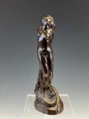 A BRONZE FIGURE OF A NUDE LADY TIED TO A POST WITH A DRAGON AROUND HER LEGS, WPO MONOGRAM AND