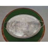 A SILVER TWO HANDLED OVAL TRAY BY HANNAM AND CROUCH, LONDON 1803, THE CENTRE ENGRAVED WITH AN