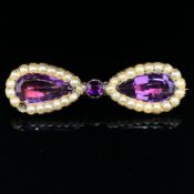 AN ANTIQUE SEED PEARL AND GEMSET BROOCH WITH CLOSED BACK SETTINGS. UNHALLMARKED, ASSESSED AS 12ct,