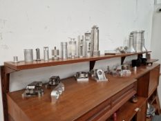 AN INTERESTING DISPLAY SELECTION OF FINELY MACHINED ALLOY INDUSTRIAL PARTS.