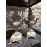 A PAIR OF EARLY 20th C.SPELTER, AGATE AND GILT METAL TWO HANDLED URNS AND COVERS CAST WITH ROCOCO