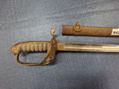A VICTORIAN OFFICERS SWORD AND IRON SCABBARD BY HENRY WILKINSON, THE SINGLE EDGED BLADE ETCHED BELOW