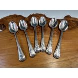 A SET OF SIX SILVER FEATHER EDGED DESSERT SPOONS, LONDON 1750, THE SHELL TOPPED HANDLES WITH A CREST