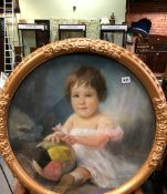 ENRICO ARCIONI (1874-1954), ARR AN OVAL PORTRAIT OF A SEATED TODDLER WITH A COLOURED BALL, PASTEL,